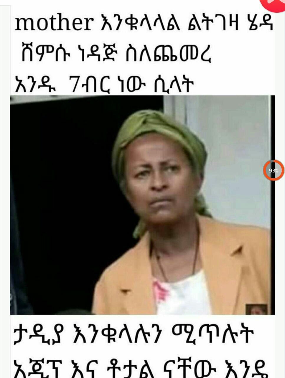 a woman in a yellow jacket and a white shirt